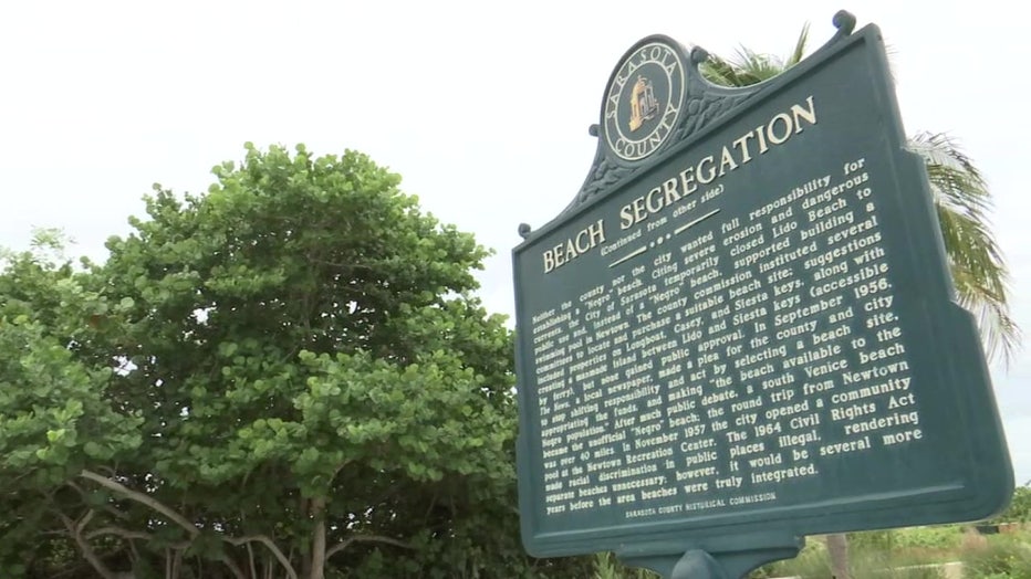 History of beach segregation sign