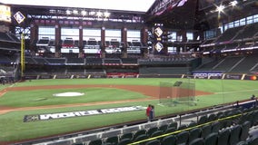 Few fans, masked umps, muted celebrations as World Series kicks off