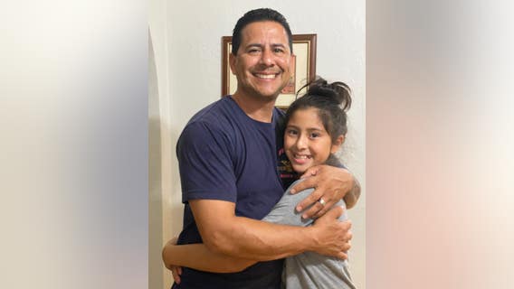 Daddy's little girl: Emotional reunion with 10-year-old and firefighting father