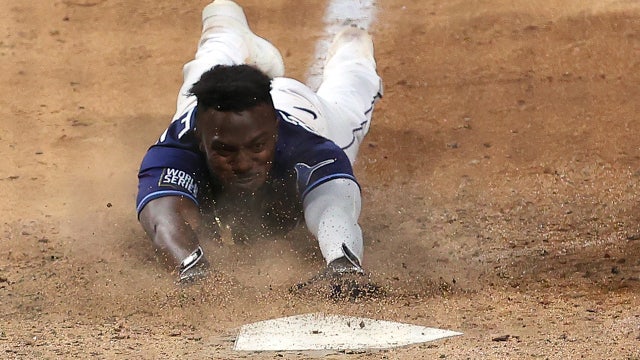 Rays' Arozarena slugs into WS history, stumbles into October lore