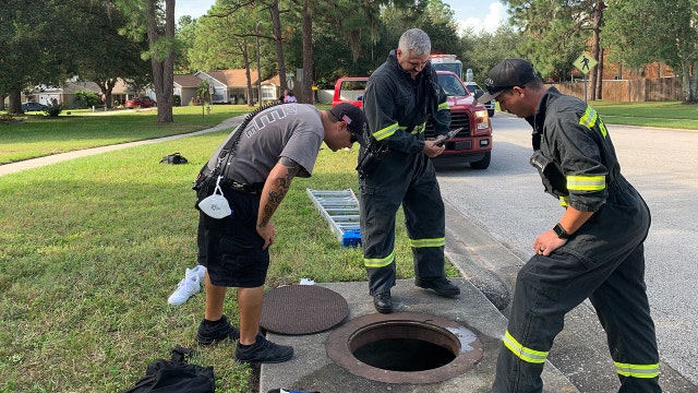 Teen rescued after getting stuck in storm drain while trying to retrieve dropped cell phone
