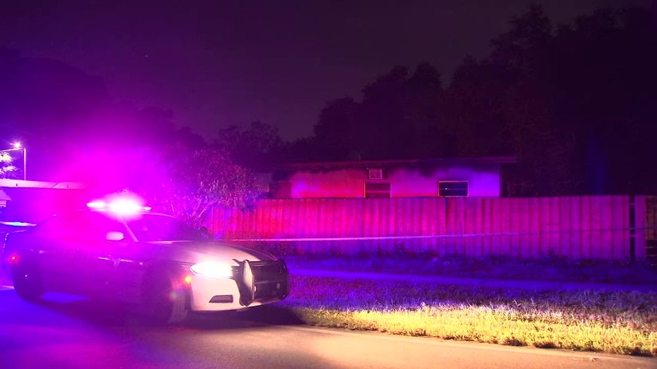 home with police car out front