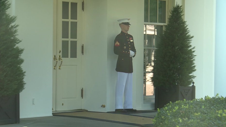 US Marine stands outside White House Oval Office