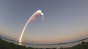 Sunset launch sends classified spy satellite to space; next crewed launch slides a day