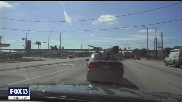 Dash cam video shows stolen utility pole on car