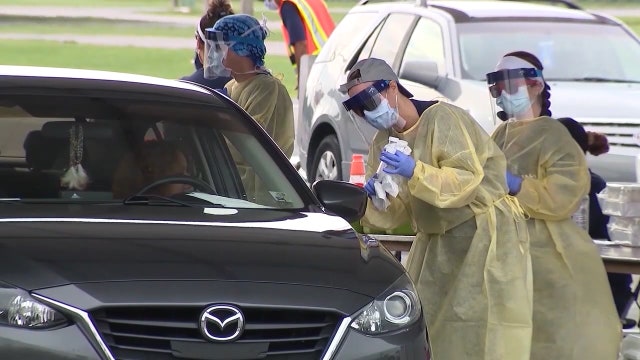 'Keep calm and carry on': Lockdown unlikely as Florida sees spike in COVID-19 cases