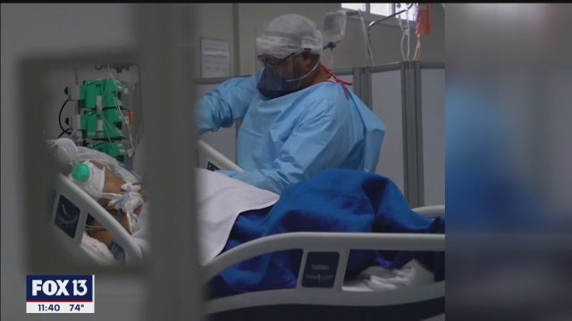 Florida COVID-19 hospitalizations up 40%; CDC urges use of face coverings