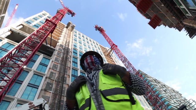 Heavy lifting, 14-hour days, gorgeous views make crane operation one of Tampa's most intense professions
