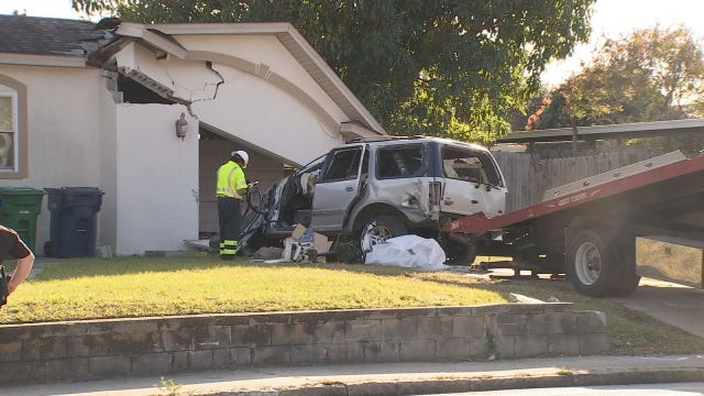 TPD: 1 dead, 1 injured after SUV crashes into Tampa home
