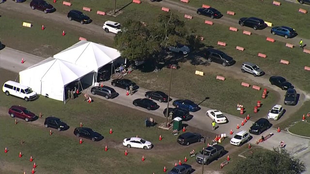 Thousands wait in long lines to get COVID-19 test before Christmas holiday