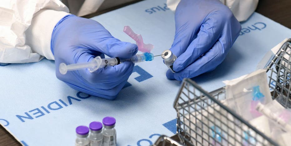 US colleges divided over requiring COVID-19 vaccinations for students