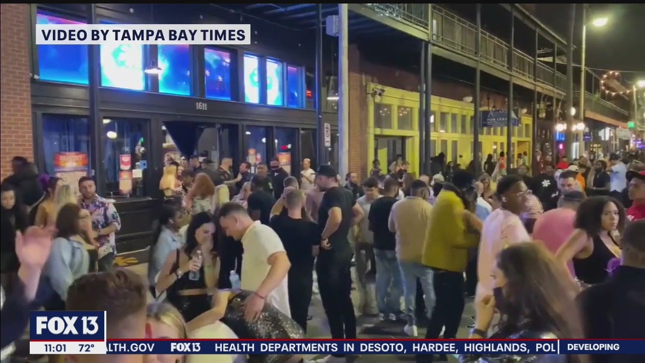 Crowded bars and streets in Ybor City illuminate the growing number of COVID-19 boxes