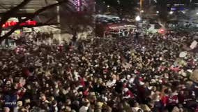 Thousands of Alabama fans pack streets celebrating Crimson Tide win despite COVID-19 warnings