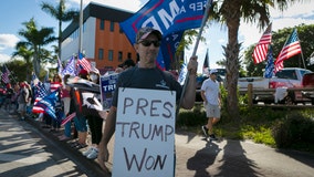 'Welcome home': Trump supporters line street near Mar-a-Lago