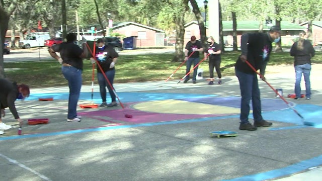 Volunteers ‘paint the town’ to brighten up Tampa’s Uptown University Area