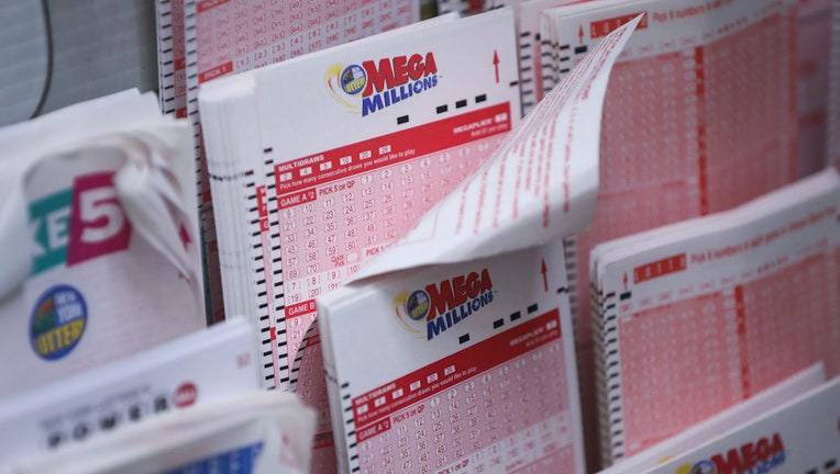 FILE - Mega Millions lottery tickets sit inside a convenience store in Lower Manhattan, Oct. 23, 2018 in New York City.