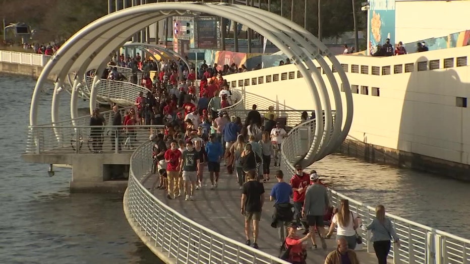 How should Lightning fans get to Saturday's game during Gasparilla?