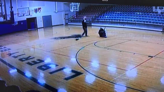 'Nothing but net': School custodian sinks half-court shot with back turned