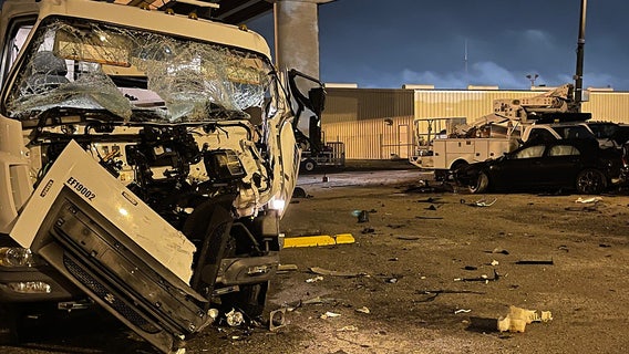 Driver killed after car crashes, falls from I-275 ramp onto utility trucks, troopers say