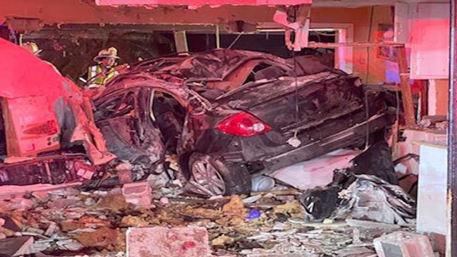 CPD: 4 people seriously injured after car crashes into home