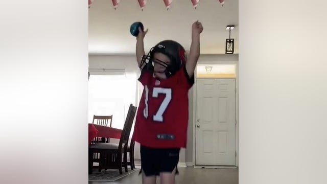 Young Bucs fan gets his first team jersey on Super Bowl Sunday