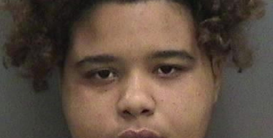 Woman accused of murdering neighbor with machete pleads guilty