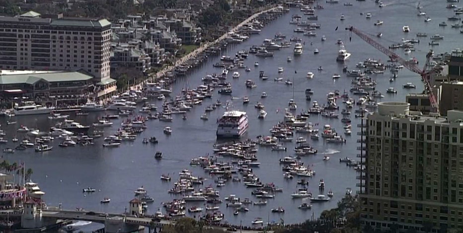 Tom Brady Tosses Super Bowl Trophy From Boat to Boat During Victory Flotilla