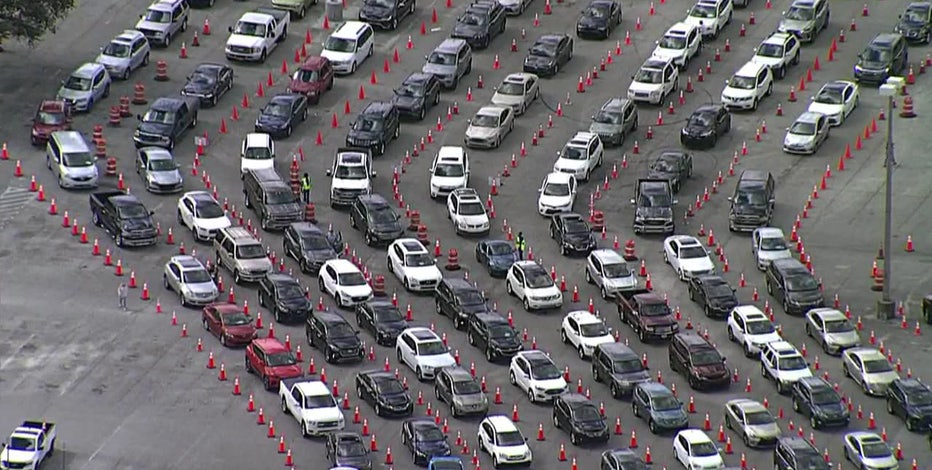 Confusion over second dose appointments creates miles-long lines at University Mall vaccination site