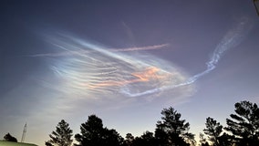 Pre-dawn rocket launch creates colorful clouds over Florida