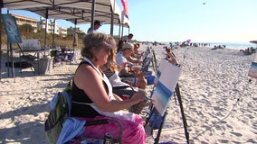 Beach art class helps participants relax by painting picture-perfect sunsets