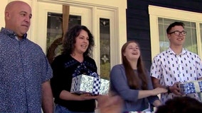 Organization surprises longest-tenured foster family with tickets to Universal Studios