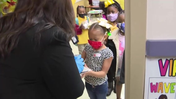 Young friends welcome chance to be less distanced at school