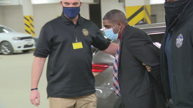 Dallas police officer arrested on two capital murder charges