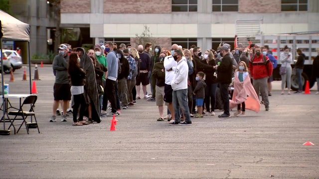 Hundreds line up to get COVID-19 vaccine outside Tampa food bank