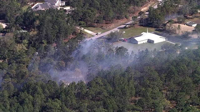 Crews contain 'fast-moving' Spring Hill brush fire