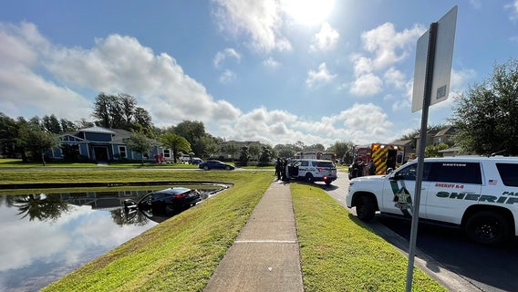 Pasco driver pulled from pond with minor injuries