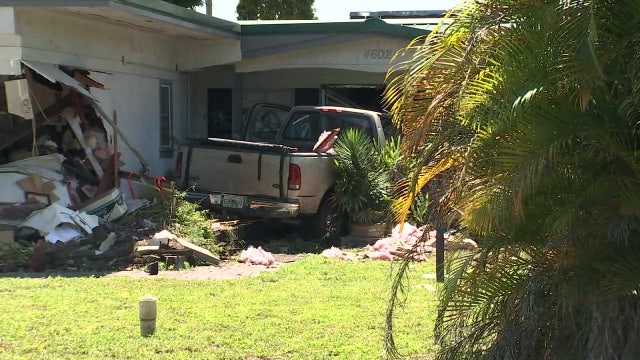 Bomb squad, hazmat respond after truck crashes into Tampa home