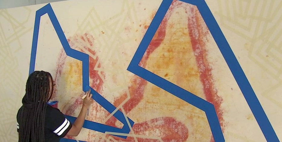 St. Pete painter living life in fast lane ahead of Grand Prix