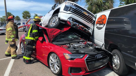 Clearwater parking lot crash leaves truck atop sedan