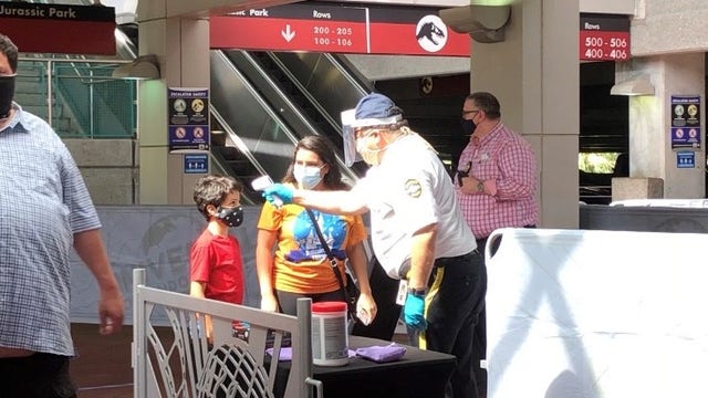 Universal Orlando to drop temperature checks for employees, guests