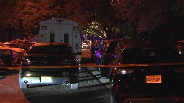 Driver found dead following shooting, crash in Riverview apartment parking lot