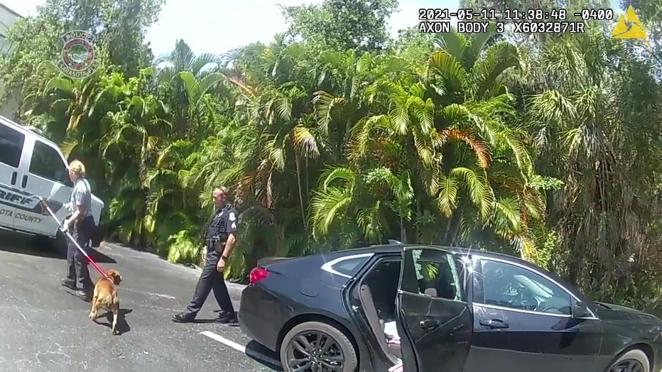 Sarasota officer breaks window to rescue dog left in hot car