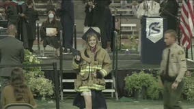 Daughter of firefighter killed in California firehouse shooting wears dad's jacket to high school graduation
