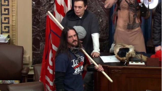 After delays, first defendant to plead guilty in Capitol riot begins jail sentence