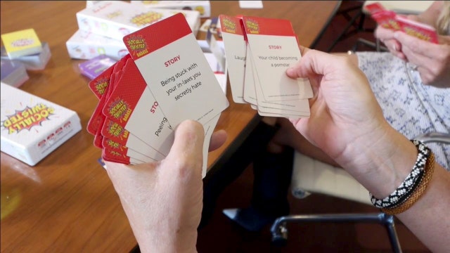 Siblings' 'twisted' card game now delights families everywhere