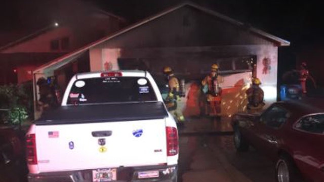 Spring Hill man wakes up to flames, gathers family, escapes house fire