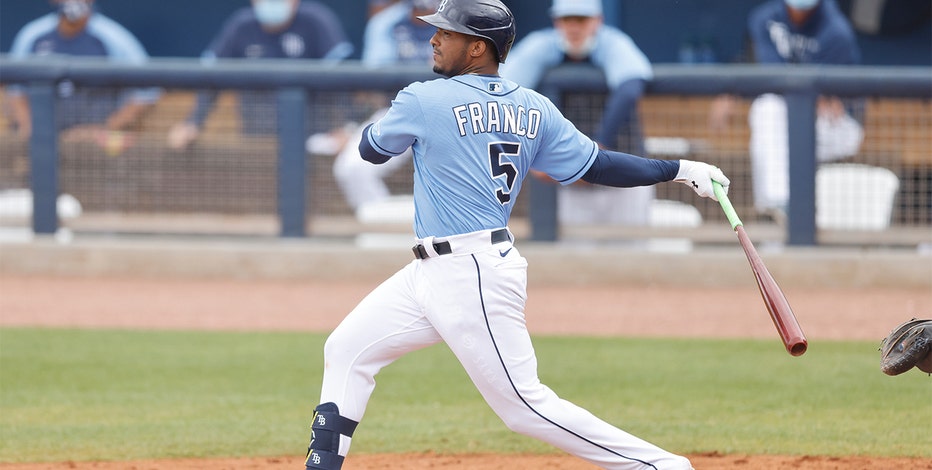 St. Petersburg, FL. USA; Tampa Bay Rays shortstop Wander Franco (5) slides  awkwardly into home plate and injures his forehead during a major league b  Stock Photo - Alamy