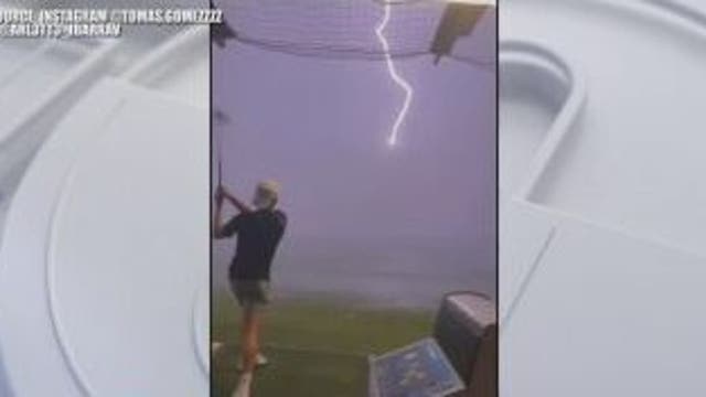 Video shows teen's golf ball being struck by lightning at Top Golf
