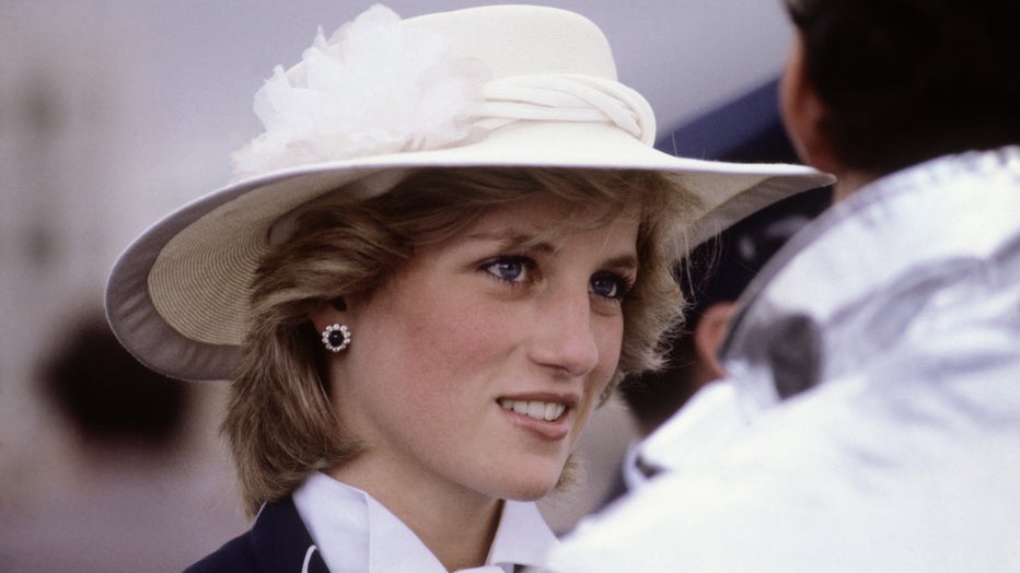 Diana Princess of Wales meets firemen during a visit to Manukau, near Auckland