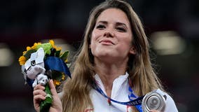 Polish Olympian auctions off medal to help fund baby's heart surgery
